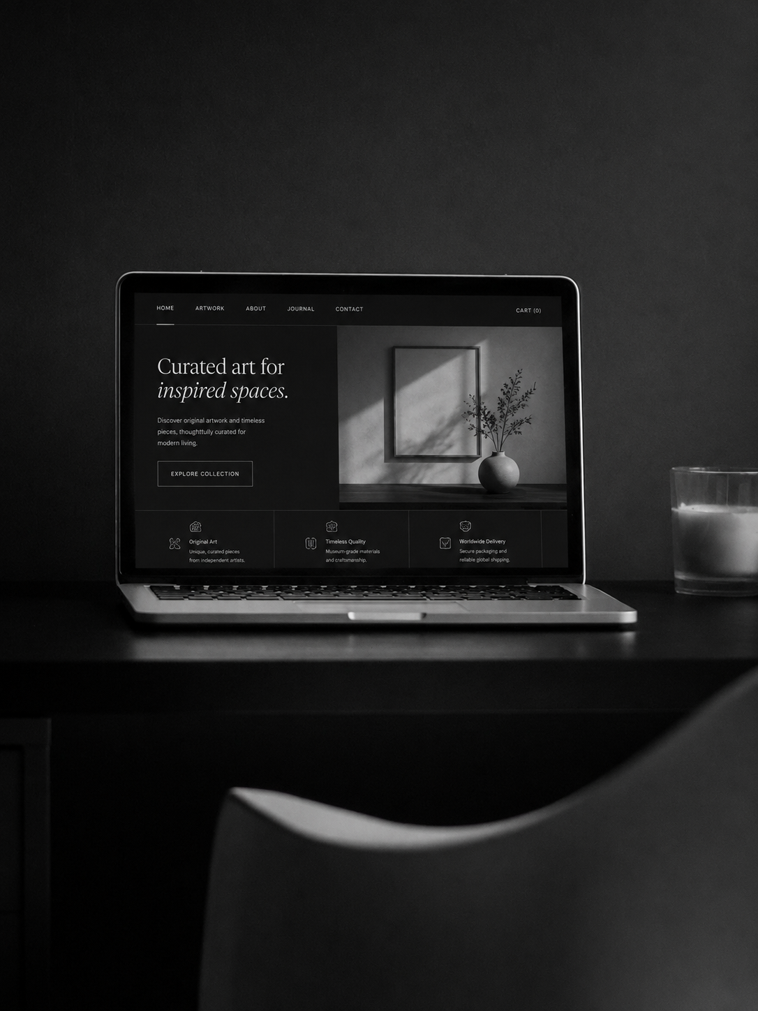 Minimal e-commerce website displayed on a laptop on a dark desk